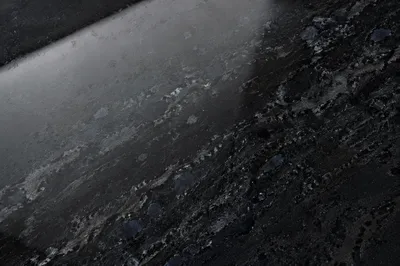 Polished Dark Granite Texture Background