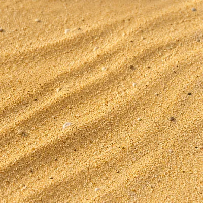 Warm Golden Beach Sand Texture Background