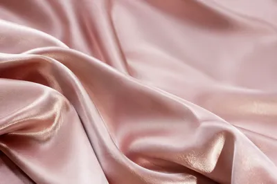 Elegant Pink Champagne Silk Fabric Background