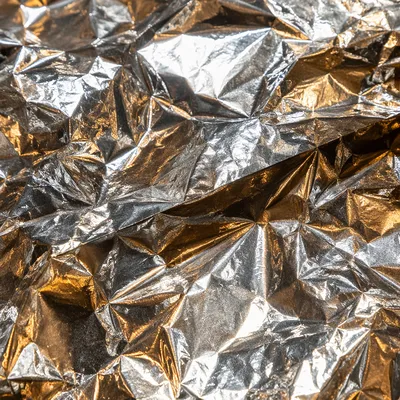 Crumpled Silver Tin Foil Metallic Texture