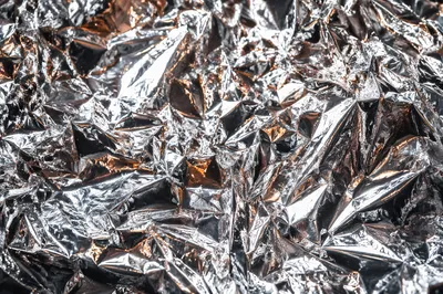 Crumpled Silver Tin Foil Metallic Texture
