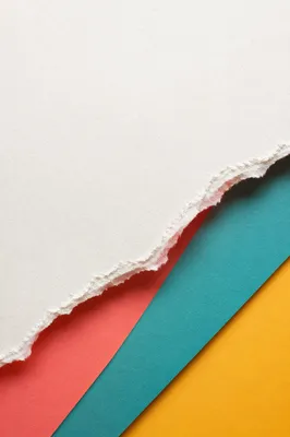 Torn White Paper Revealing Color Gradient