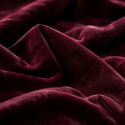 Deep Burgundy Velvet Folded Texture Background