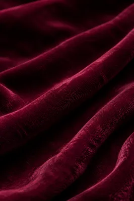 Deep Burgundy Velvet Folded Texture Background