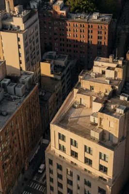 Golden Hour Aerial View of Urban Rooftops
