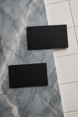 Minimal Black Business Cards on Marble