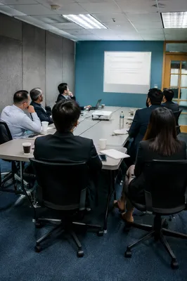 Professional Team Meeting in Modern Conference Room