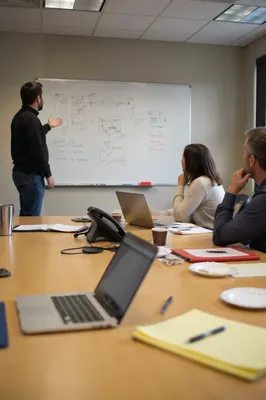 Candid Business Team Meeting in Office