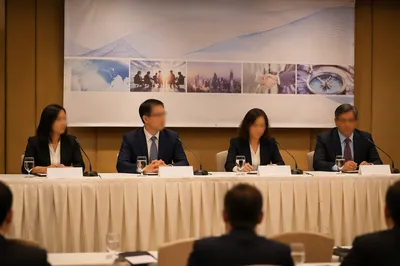 Professional Business Panel Meeting at Conference Table