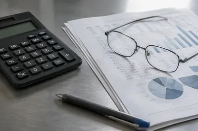 Calculator and Financial Documents Close Up