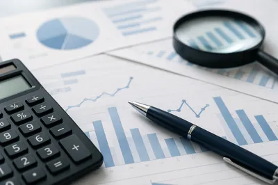 Calculator on Financial Documents Close Up