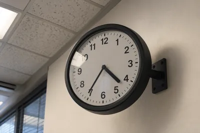 Office Wall Clock Time Management Concept