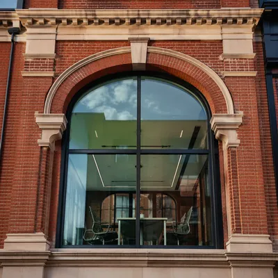 Modern Conference Room Behind Arched Glass Wall