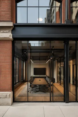 Modern Glass Conference Room in Brick Office