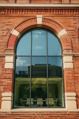 Modern Conference Room Behind Arched Glass Wall