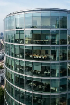 Modern Glass Office Tower with Meeting Rooms