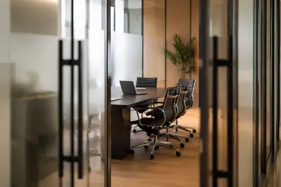 Modern Glass-Walled Conference Room Interior