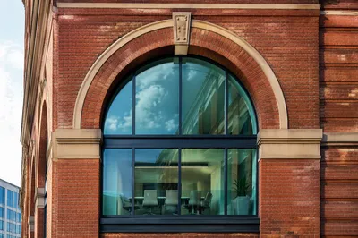 Modern Conference Room Behind Arched Glass Wall