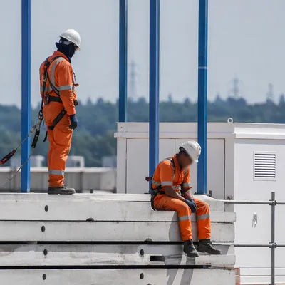 Construction Workers on Concrete Slabs