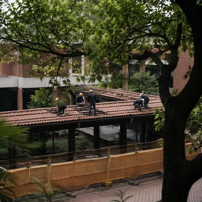 Urban Roof Renovation Crew at Work