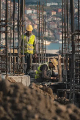 Construction Workers in Urban Building Site