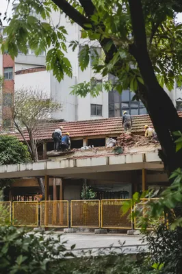 Urban Roof Renovation Crew at Work