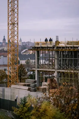 Urban Construction Workers with Tower Crane