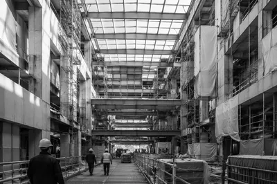 Hard Hat Workers in Commercial Construction Atrium