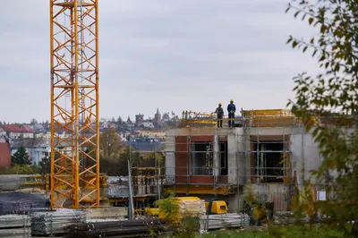 Urban Construction Workers on Concrete Site