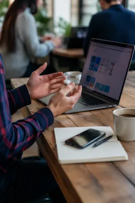Freelancer Conversation at Modern Coworking Desk