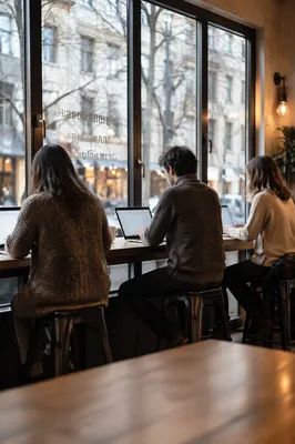 Freelancers Working in Cozy Coworking Cafe