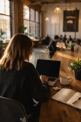 Focused Freelancer in Warm Coworking Space