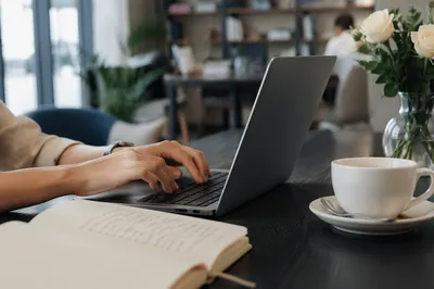 Freelancer Working in Cozy Coworking Lounge