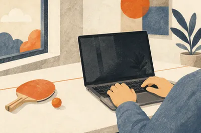 Creative Startup Workspace with Laptop and Paddle