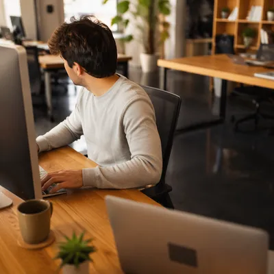 Startup Entrepreneur in Creative Office Workspace