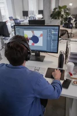 Creative Entrepreneur Working at Startup Office Desk