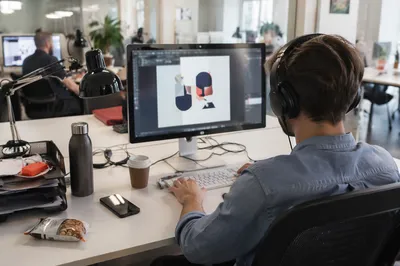 Creative Entrepreneur Working at Startup Office Desk