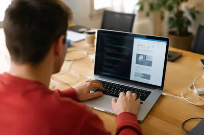 Startup Entrepreneur Coding in Creative Office