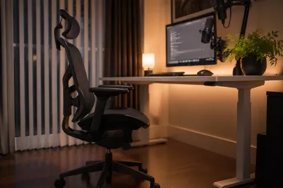 Ergonomic Office Chair Beside Standing Desk