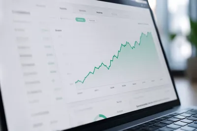 Rising Financial Analytics Dashboard on Laptop