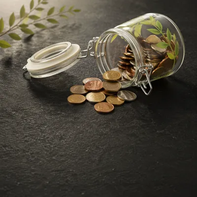 Glass Savings Jar with Coins Growth