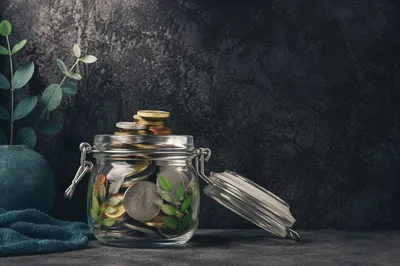 Glass Jar Coin Savings Growth Concept