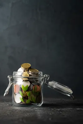 Glass Jar Coin Savings Growth Concept
