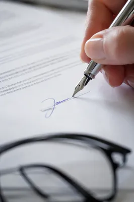 Signing Business Contract With Fountain Pen