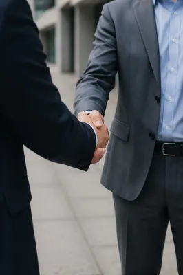 Professional Handshake Business Agreement in Daylight