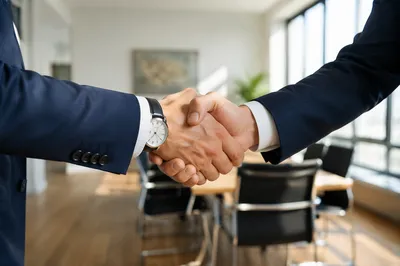 Professional Handshake in Modern Office