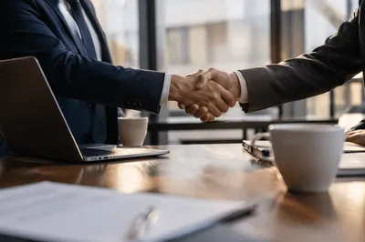 Professional Handshake Sealing Business Agreement