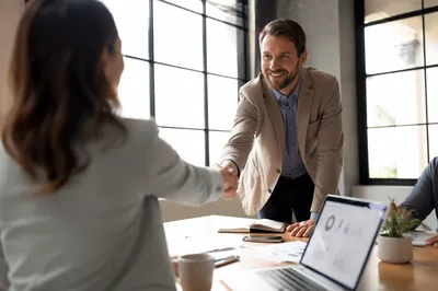 Professional Handshake in Modern Conference Room