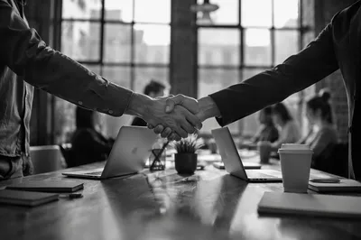 Black and White Business Handshake Agreement