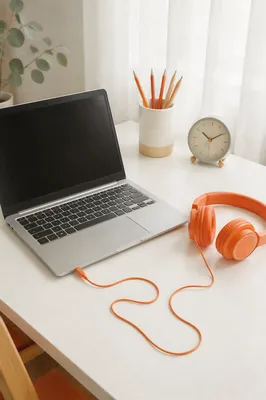 Minimal Home Office Desk with Orange Headphones